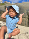 pale, blue, woven, bucket, hat, blue, onesie, button, buttons, pocket, baby, sitting, in, the, sand, summer, henry,