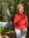 Small Curly Hair Boy, rust, Pique Shirt, Rembert Shirt, stone, pants, boy, standing, next, to, fence, henry,