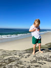 Boy wearing , green, twill, shorts, henry, printed, short, sleeved, shirt, button, buttons, casual, spring, summer, henry.