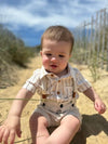 beige, brown, white, wide, stripe, stripes, striped, button, buttons, pocket, collar, woven, onesie, dark, hair, baby, wearing, beige, shorts, with, suspenders, summer, henry, .