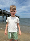 Little, boy, wearing, white, palm, embroidered, tee, sage, shorts, dark, hair, summer, henry.