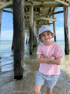 Navy, white, stripe, seersucker, woven, bucket, hat, , matching, shorts, pink, tee, boy, standing, next, to, pier, summer, henry.