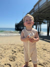 beige, cream, ribbed, playsuit, button, buttons, little, boy, holding, a, big, sea, shell, spring, summer, henry.