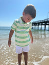 boy, on, shore line, in, lime, royal, white, stripped, stripes ,short,  sleeved, sleeves, polo, white, shorts