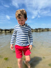 Boy  Playing in the sea, in Red shorts, Navy/Cream, Stripe, Stripped,  Stripes 
Hooded top, Long Sleeved, Sleeves, Sleeve ,by Henry.