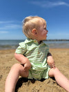 lime, cream,  striped, stripe, stripes, pique, polo, romper, button,  buttons,      collar, fair, hair, little, boy, sitting, on,         beach, spring, summer, henry. 