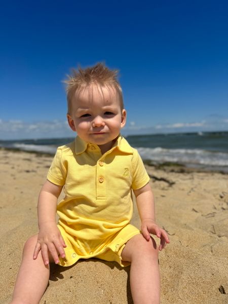 lemon, pique, polo, romper, collar,              button, buttons, little, boy, sitting, in, the, sand, holding, a, shell, spring, summer, henry.