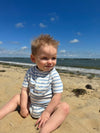 raglan, blue, white, striped, onesie, sleeves, button, buttons, brown, hair, baby, at, the, beach, playing, in, the, sand, summer henry., 