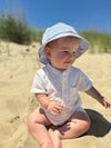 Lobster, seersucker, woven, bucket, hat, white, onesie, baby, playing, in, the, sand, summer, henry.