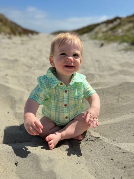 green, neon, plaid, woven, onesie, button, buttons, pocket, collar, little, boy, sitting, in, the, sand, with, his, legs, crossed, summer, henry.