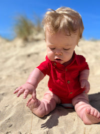 Red cotton short sleeved woven onesie