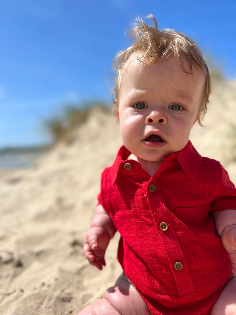 Red cotton short sleeved woven onesie
