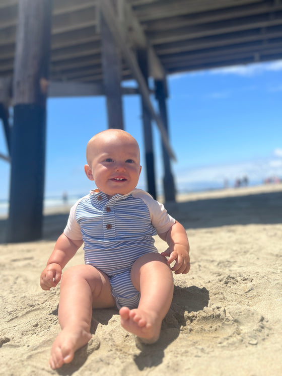 blue, white, Henley, raglan, button, buttons, pocket, onesie, happy, baby, boy, sitting, next, to, the, pier, summer, henry.