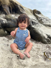 little, baby, wearing, navy, heathered, bubble, dark, hair, sitting, in, sand, playing, with, the, sand, summer, henry.