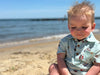 baby, boy, on, the, beach, blue, nautical, printed, romper, button, buttons, collar, brown, hair, spring, summer, henry.