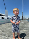 little, boy, at, the, board, walk, navy, Hawaii, printed, romper, button, buttons, collar, pocket, spring, summer, henry.