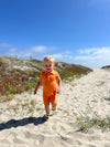 tangerine, pique, polo, romper, button, buttons, collar, fair, hair, little, boy,              at, the, beach, cool, look, spring, summer, henry,