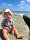 white, twill, bucket, hat, grey, white, onesie, button, buttons, pocket, little, baby, boy, sitting, in, sand, summer, henry.