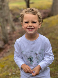 little boy, blonde curly hair, wearing, white Henry 10th collection snow angels tee, outside, in the garden