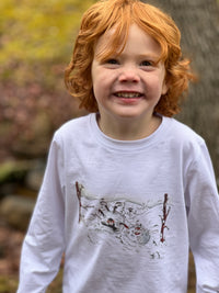 little boy, ginger hair, wearing Henry 10th collection print tee with snowballing Henry