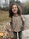 Curly, hair, boy in, Beige, Tan, Mock, sleeved, sleeves, sleeve, Tee, warm, casual, Charcoal, Jeans.