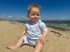 blue, white, stripe, romper, button, buttons, collar, pocket, little, baby, boy, sitting, on, the, beach, cool, spring, summer, henry.