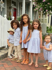 Blue floral print short sleeved woven onesie
