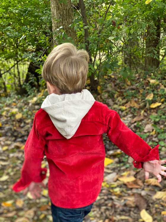Boy running away in a, Red, cord, corduroy, hooded, hood, woven, shirt, warm, casual, buttoned, pocket, Henry.